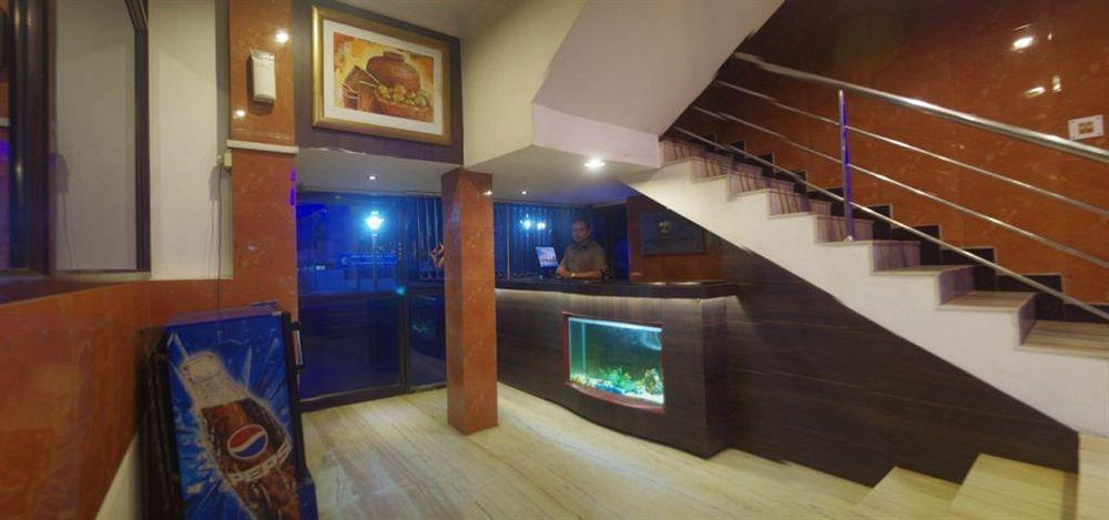 Deluxe Hotel شيناي المظهر الخارجي الصورة