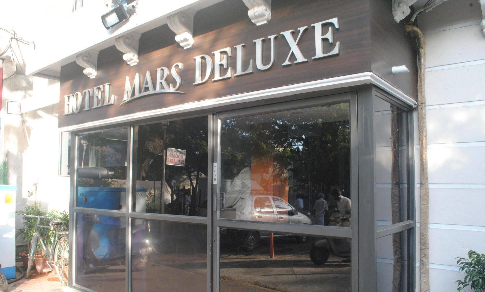 Deluxe Hotel شيناي المظهر الخارجي الصورة